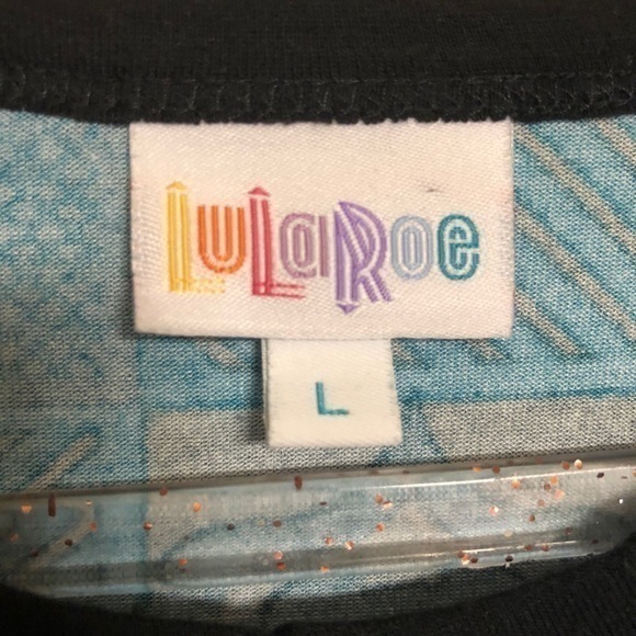 Fun Lularoe Top in Blue with geometric Pattern - Picture 3 of 9